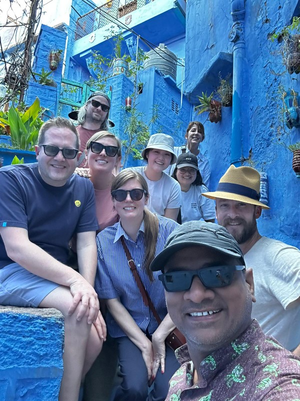 Group of guests on heritage walk in Jodhpur's blue alleyways